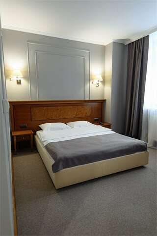 Гостиница Медвежий угол Сургут Стандартный двухместный номер с 1 кроватью или 2 отдельными кроватями-1